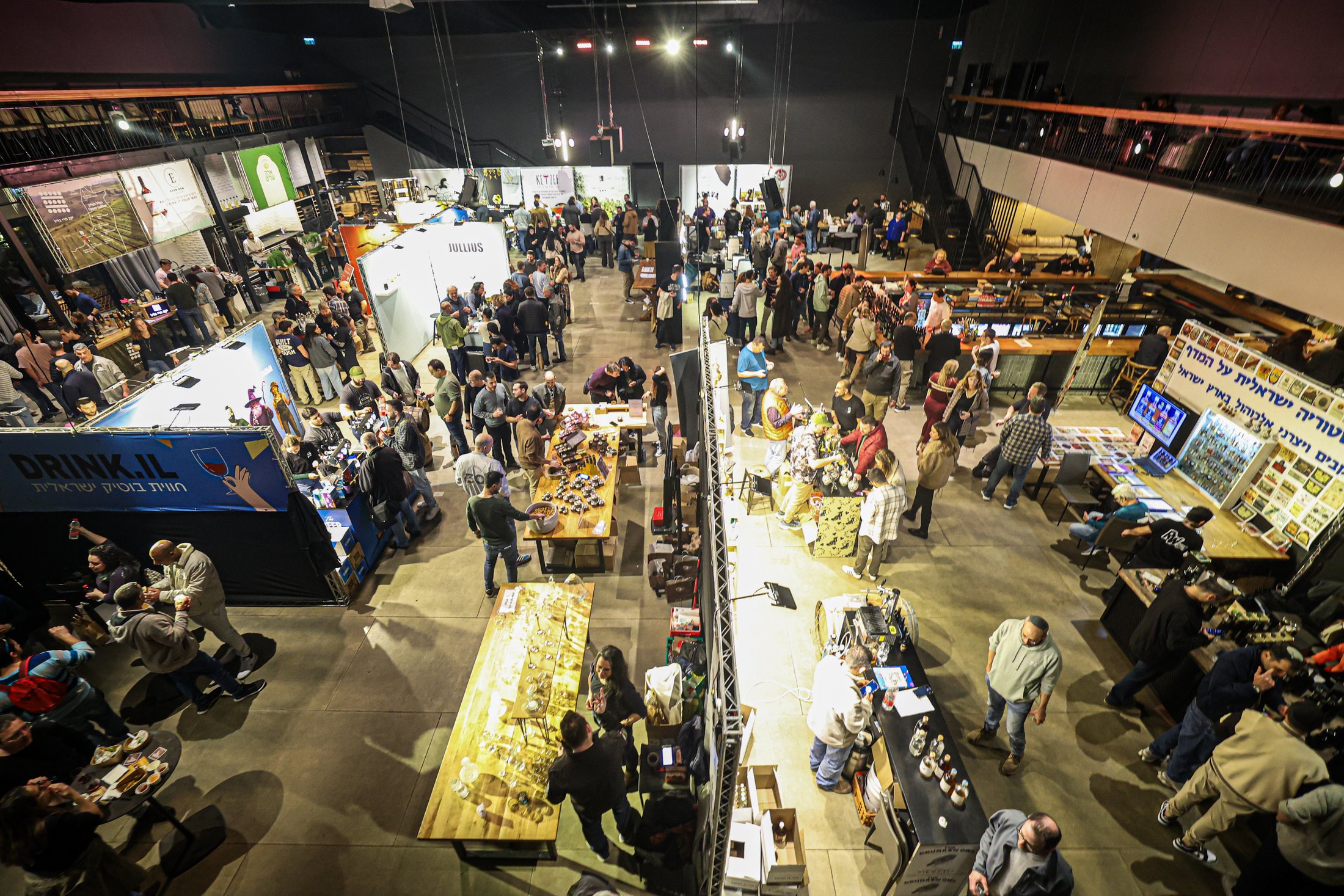 Overhead view of busy aisles between festival stands.