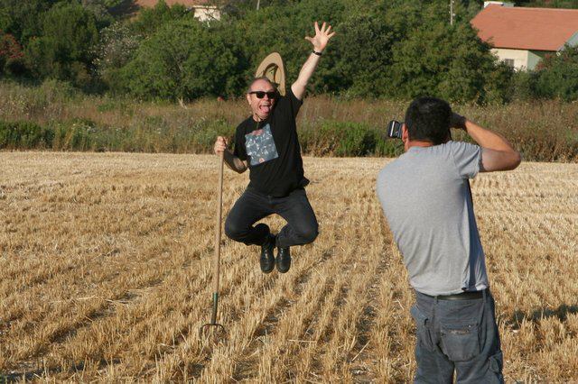 Yoav Kutner jumps in a field during a photo shoot for the festival.